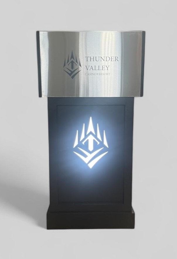 Illuminated logo podium
